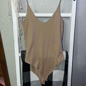 Tan body suit